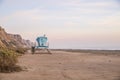 Lifeguard tower at dusk on quiet beach