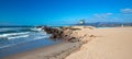 Lifeguard tower and rock jetty seawall in Ventura California USA