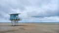 Lifeguard tower on the sand of Deauville beach in panorama with cloud sky Royalty Free Stock Photo