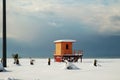 Lifeguard tower at the snow covered beach Royalty Free Stock Photo