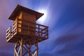 Lifeguard tower under the moonlight. Wooden lifeguard tower at night. Wooden structure in a European beach. Lifeguard hut, Royalty Free Stock Photo