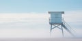 Lifeguard Tower in a white mist on a beach of seaside. Lonely landscape with watchtower. Generative AI Royalty Free Stock Photo