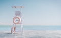 Lifeguard tower on white sand beach with sea view. Royalty Free Stock Photo