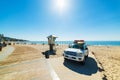 Lifeguard truck and hut in Laguna Beach shore Royalty Free Stock Photo