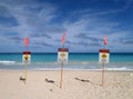 Lifeguard warnings signs place in sand on beach