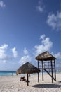 Lifeguard watch tower and beach umbrella, Caribbean sea coast, Cancun Royalty Free Stock Photo
