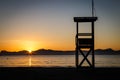 Lifeguard watchtower on Alcudia beach at sunrise