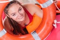 Lifeguard woman on duty with ring buoy lifebuoy. Royalty Free Stock Photo