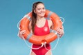 Lifeguard woman on duty with ring buoy lifebuoy. Royalty Free Stock Photo