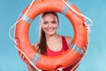 Lifeguard woman on duty with ring buoy lifebuoy. Royalty Free Stock Photo