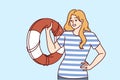 Lifeguard woman with lifebuoy guaranteeing safety of pool visitors or people relaxing on seashore
