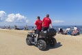 Lifeguards on ATVs driving along the coastline of the Baltic Sea in especially dangerous weather