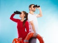 Lifeguards on duty looking through binoculars Royalty Free Stock Photo