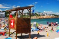 Lifeguards look over the crowd and seashore