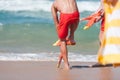 Lifeguards getting ready for an ocean rescue Royalty Free Stock Photo