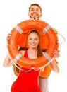 Lifeguards in life vest with ring buoy having fun.