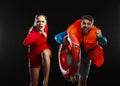 Lifeguards in life vest with ring buoy.