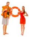 Lifeguards in life vest with ring buoy. Success. Royalty Free Stock Photo