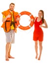 Lifeguards in life vest with ring buoy. Success. Royalty Free Stock Photo