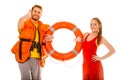 Lifeguards in life vest with ring buoy. Success. Royalty Free Stock Photo