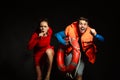 Lifeguards in life vest with ring buoy whistling. Royalty Free Stock Photo