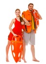 Lifeguards with rescue ring buoy and life vest. Royalty Free Stock Photo