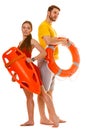 Lifeguards with rescue and ring buoy lifebuoy.