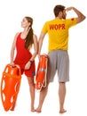 Lifeguards with rescue and ring buoy lifebuoy. Royalty Free Stock Photo