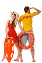 Lifeguards with rescue and ring buoy lifebuoy. Royalty Free Stock Photo