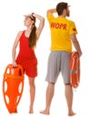 Lifeguards with rescue and ring buoy lifebuoy. Royalty Free Stock Photo