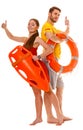 Lifeguards with rescue and ring buoy lifebuoy. Royalty Free Stock Photo