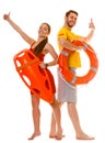 Lifeguards with rescue and ring buoy lifebuoy. Royalty Free Stock Photo