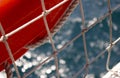 Lifeline, rope net and side of an old historic ship in close-up Royalty Free Stock Photo