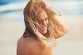 Lifes a beach. an attractive young woman standing on a beach. Royalty Free Stock Photo