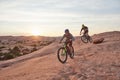 Lifes a journey, enjoy it on a mountain bike. Full length shot of two young male athletes mountain biking in the