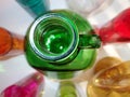 lifesavers original colors, assorted colorful glass bottles with green in middle,