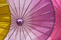 Lifesize colorful cocktail umbrellas, illuminated. Royalty Free Stock Photo