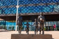 Bronze Family Sculpture and Contemporary Library Exterior, Birmingham, UK Royalty Free Stock Photo