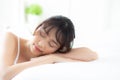 Lifestyle beautiful portrait young asian woman relax lying sleep and smile while wake up with sunrise at morning Royalty Free Stock Photo