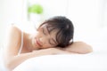 Lifestyle beautiful portrait young asian woman relax lying sleep and smile while wake up with sunrise at morning Royalty Free Stock Photo