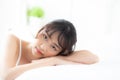 Lifestyle beautiful portrait young asian woman relax lying sleep and smile while wake up with sunrise at morning Royalty Free Stock Photo