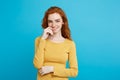 Lifestyle concept - Close up Portrait young beautiful attractive ginger red hair girl playing with her hair with shyness Royalty Free Stock Photo