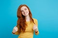 Lifestyle concept - Close up Portrait young beautiful attractive ginger red hair girl playing with her hair with shyness Royalty Free Stock Photo