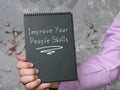 Lifestyle concept meaning Improve Your People Skills with sign on the page