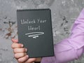 Lifestyle concept meaning Unlock Your Heart with phrase on the sheet