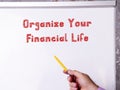 Lifestyle concept about Organize Your Financial Life with inscription on the piece of paper