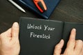 Lifestyle concept about Unlock Your Firestick with inscription on the piece of paper