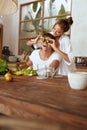 Lifestyle. Couple At Kitchen Cooking Healthy Vegetarian Food And Having Fun. Handsome Man And Beautiful Woman. Royalty Free Stock Photo