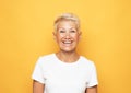 lifestyle, emotion and old people concept: Portrait of blond optimistic old lady Royalty Free Stock Photo