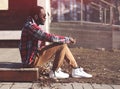 Lifestyle fashion portrait of stylish young african man